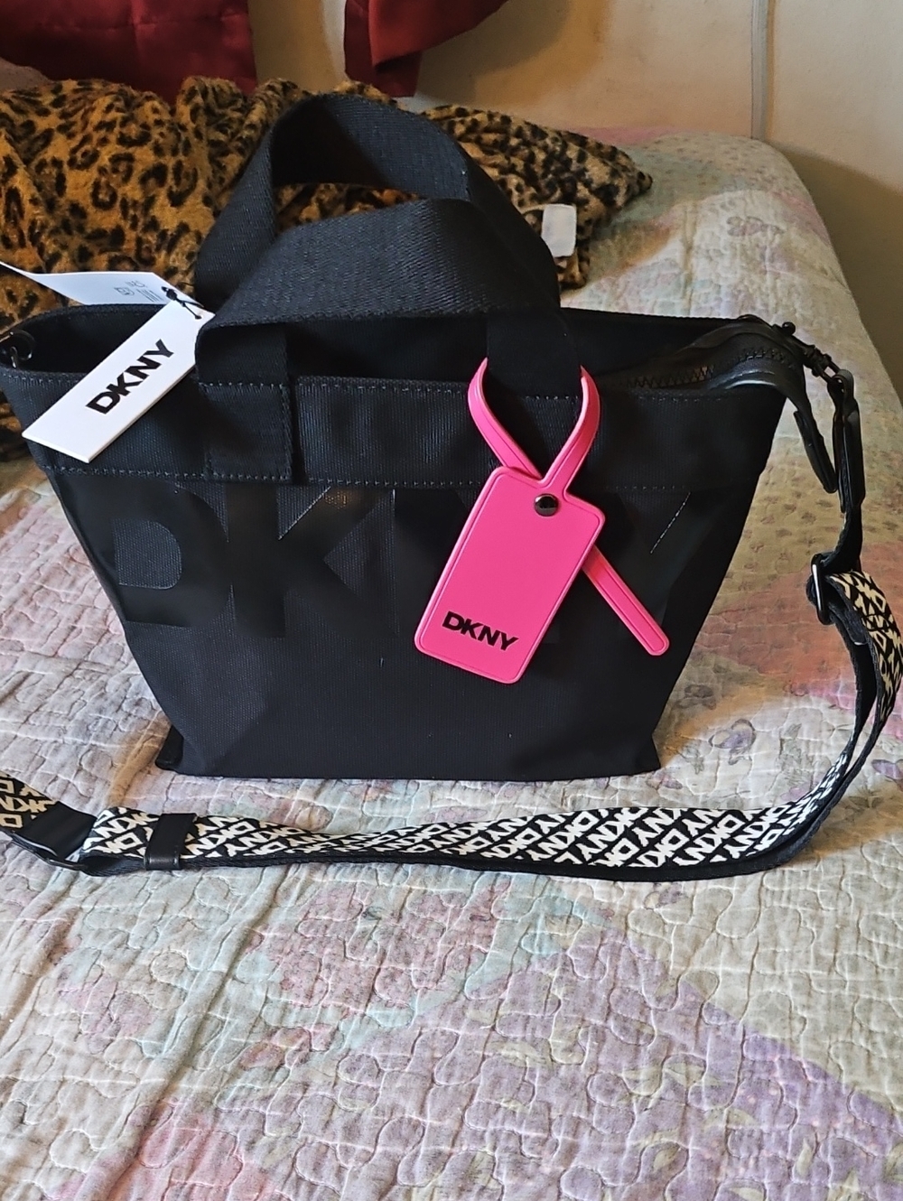DKNY Black Crossbody Tote with Pink Tag and Logo Strap